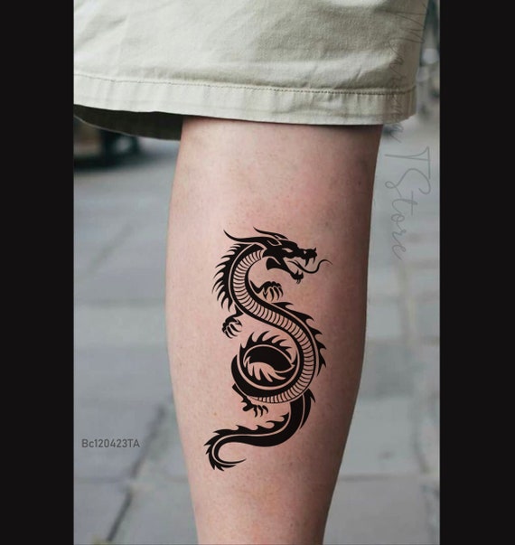 Tribal dragon tattoos Sticker design inspiration Dragon tattoo