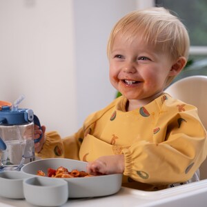ÜneeQbaby Waterproof Coverall Weaning Bibs - Pack of 2, Long Sleeve, Fruit and Sweets, Oeko-TEX certified, Chest Pocket