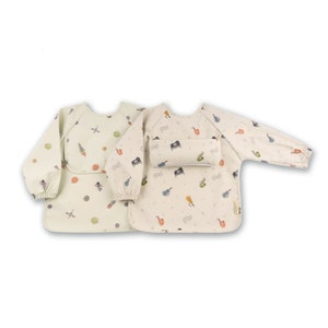 ÜneeQbaby Waterproof Coverall Weaning Bibs - Pack of 2, Long Sleeve, Space and Music, Oeko-TEX certified, Chest Pocket