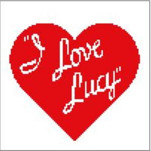 May include: A red heart with the text "I Love Lucy" in white cursive writing.