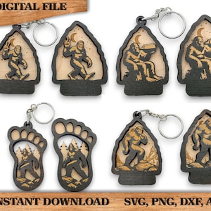 May include: Set of six laser cut wooden keychains featuring different Bigfoot designs. The keychains are in the shape of a footprint, an arrowhead, and a crescent moon. The designs feature Bigfoot walking, sitting, and holding a beer.