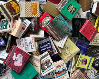May include: A collection of vintage matchbooks with various designs and colors. The matchbooks feature a variety of businesses and organizations, including hotels, restaurants, and banks. Some of the matchbooks have illustrations of animals, buildings, and other objects.