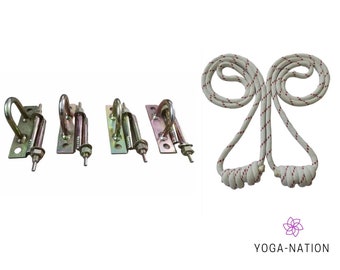 May include: Four metal ceiling hooks with a white rope with red stripes attached to each hook. The hooks are designed for hanging a yoga swing.