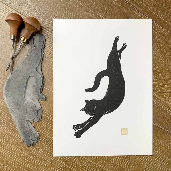 Stretching cat #1 hand printed lino cut print in black ink | Handmade original blockprint art. A great gift for cat lovers! By Megan Abel