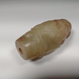 Jade Bead Pendant with Ancient Dragon Design