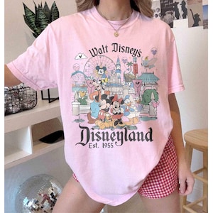 May include: A rustic wooden sign with the text "Welcome to our home" in white lettering. The sign features a distressed finish and a simple, inviting design, perfect for entryway decor.