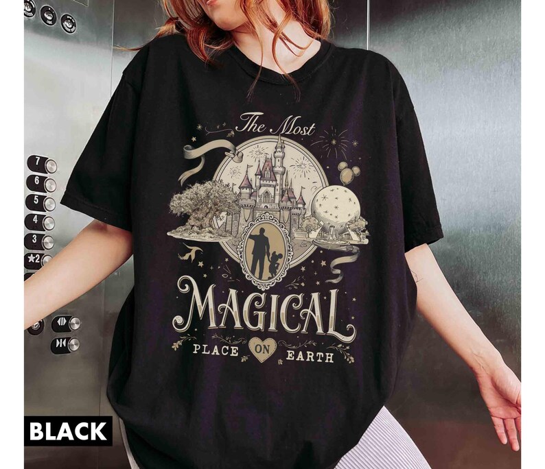 May include: A white ceramic mug with a black handle and the text "But First, Coffee" in a bold, black font. The mug is set against a neutral background, highlighting its simple design.