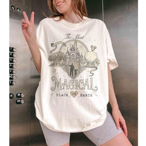 May include: A set of three ceramic mugs with a speckled, matte finish. Each mug features a different color: light blue, cream, and gray. The mugs have a simple, modern design and a comfortable handle.