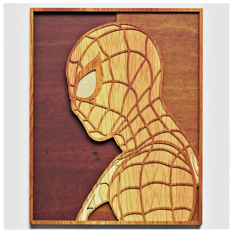 May include: A wooden wall art piece featuring a cutout of a red and black Spiderman character. The background is a dark brown wood.