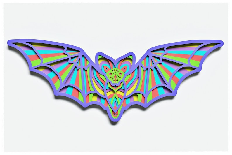 May include: A colourful paper cut-out bat with a layered design. The bat is made of purple, green, yellow, pink, and blue paper.