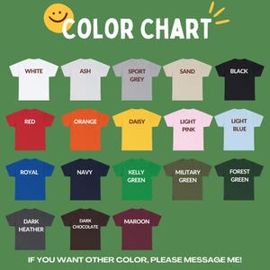 May include: Color chart showing 18 different t-shirt colors. The colors are: white, ash, sport grey, sand, black, red, orange, daisy, light pink, light blue, royal, navy, kelly green, military green, forest green, dark heather, dark chocolate, and maroon.