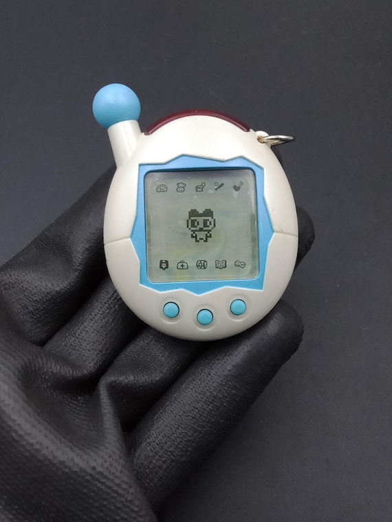 SKU B833P9918 | Bandai Japanese Tamagotchi V4 Connection White