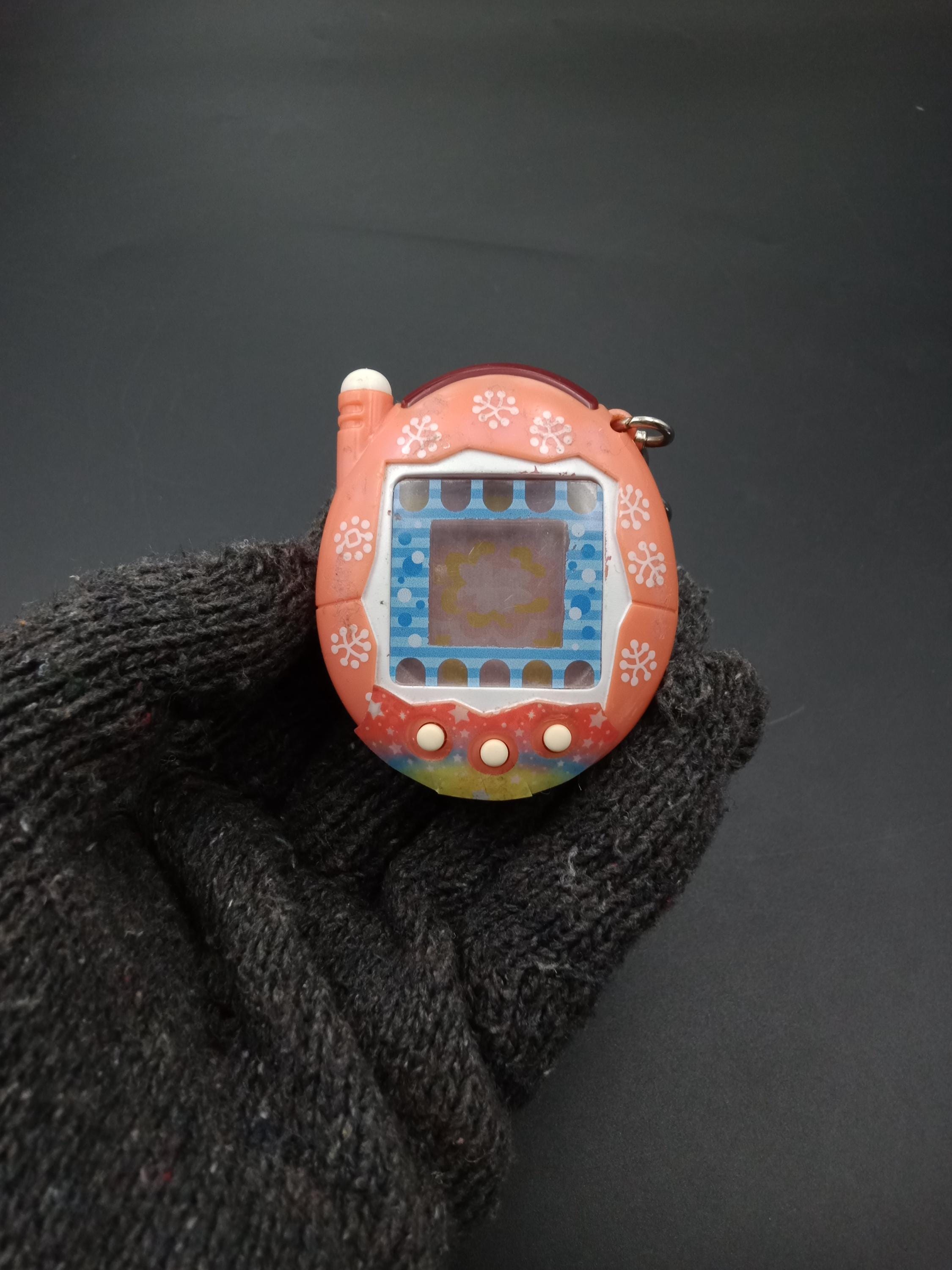 SKU B788P8999 | Bandai Keitai Kai Two Tamagotchi Plus White Clover