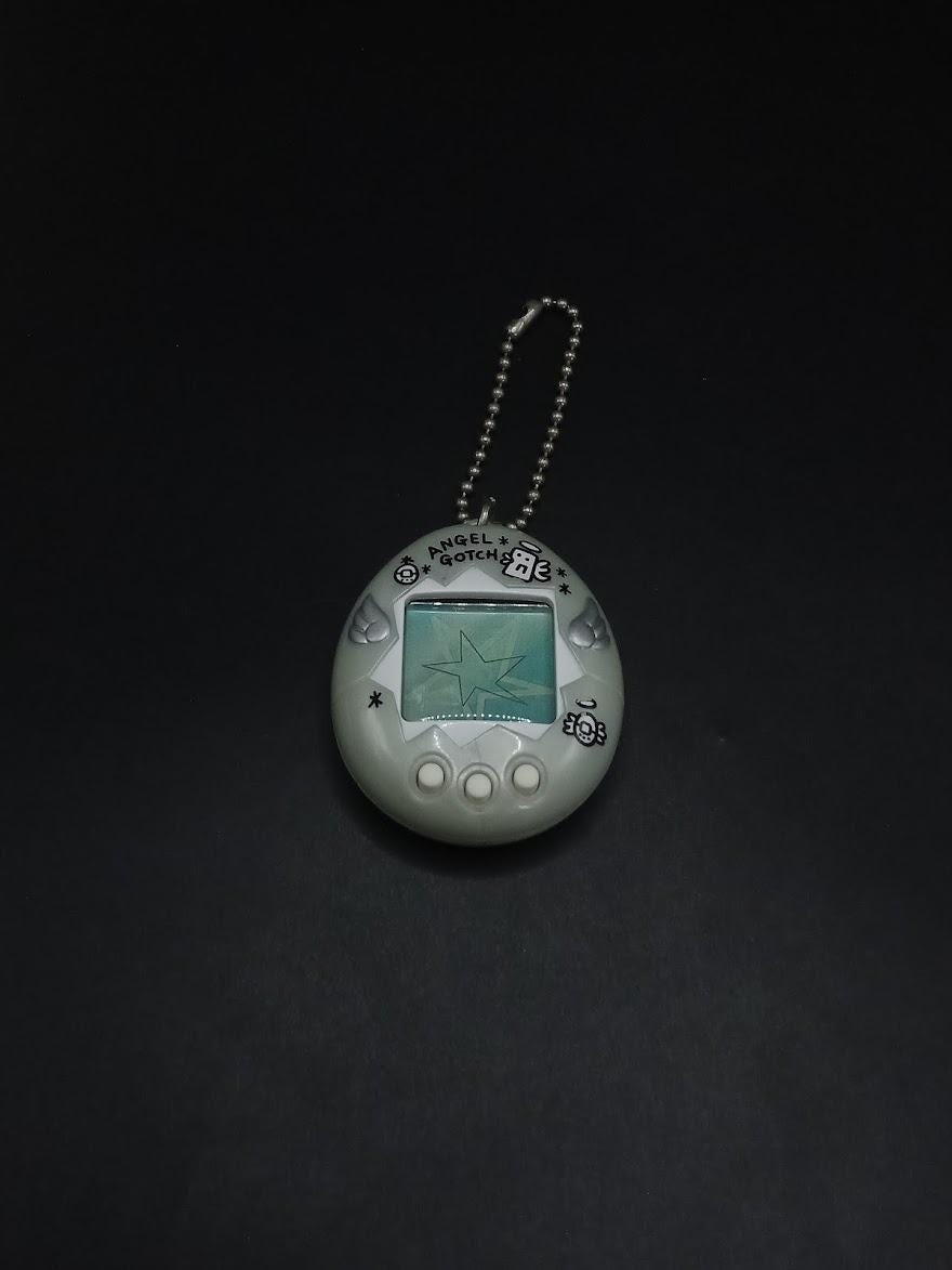ＡＮＧＥＬ ＧＯＴＣＨ SKU B54P412TA8 | BANDAI Tamagotchi Angel Blue Japanese Silver
