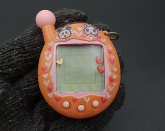 SKU B779P8726 | Bandai Tamagotchi Plus Pink