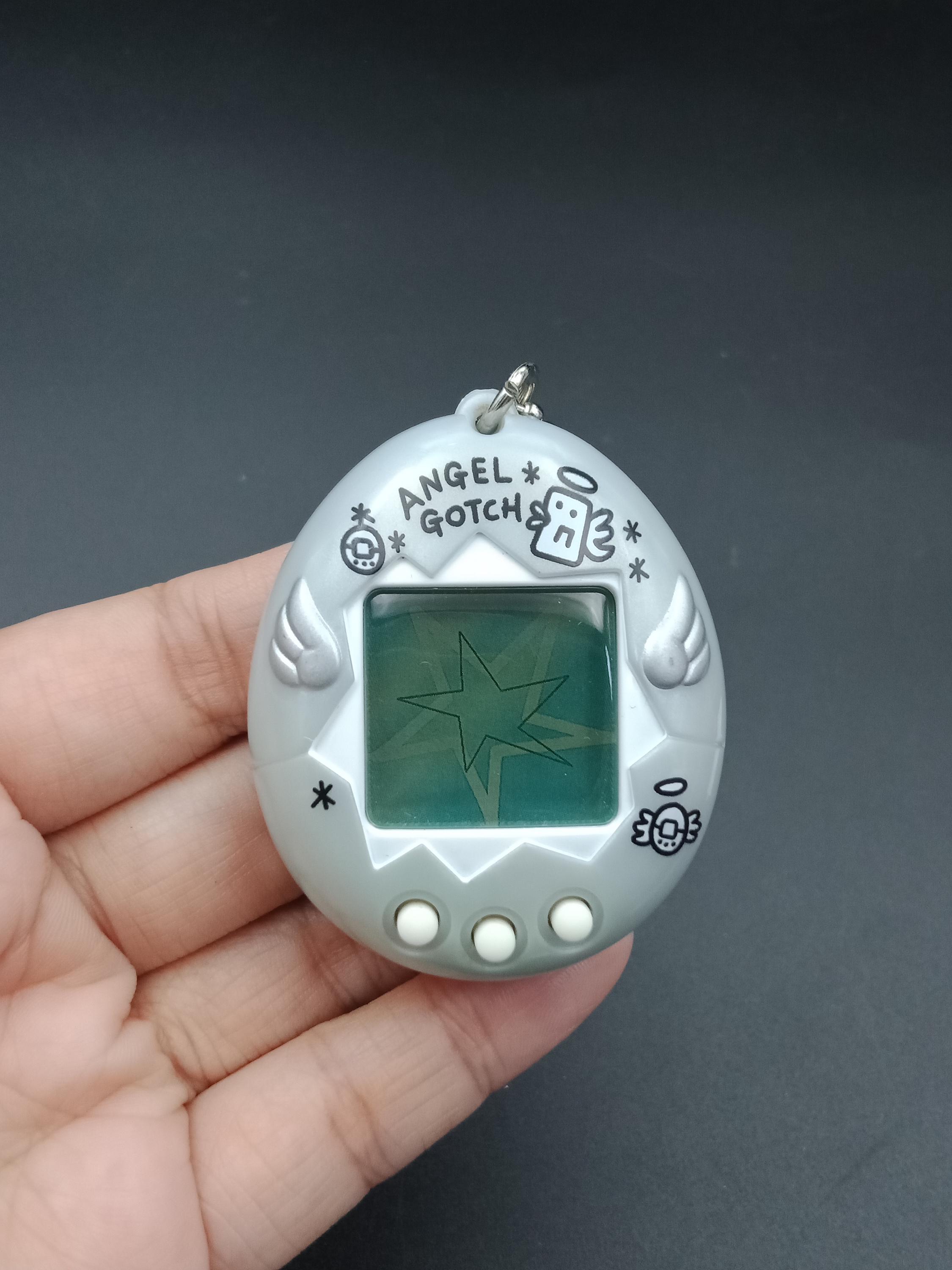 ＡＮＧＥＬ ＧＯＴＣＨ SKU B924P11740 | Bandai Japanese Tamagotchi Angel Gotch Silver - Etsy