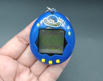 SKU YU114 | Tamagotchi P1/P2 Blue Spaceship Bandai Japanese Toy