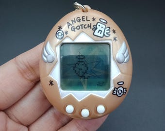 SKU B825P9756 | Bandai Tamagotchi Angel Gotch Japanese Silver