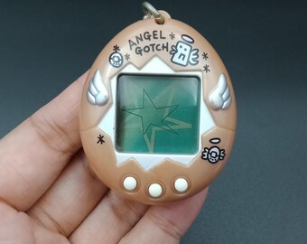 SKU YU4 | Bandai Japanese Tamagotchi Angel Gotch Pink