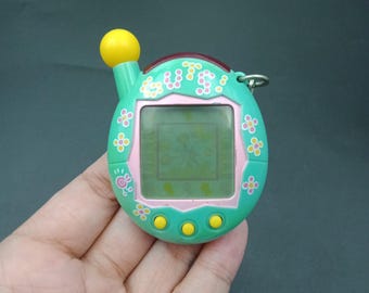 SKU B646P6716 TA8 | Original 1997 Bandai's Tamagotchi Virtual