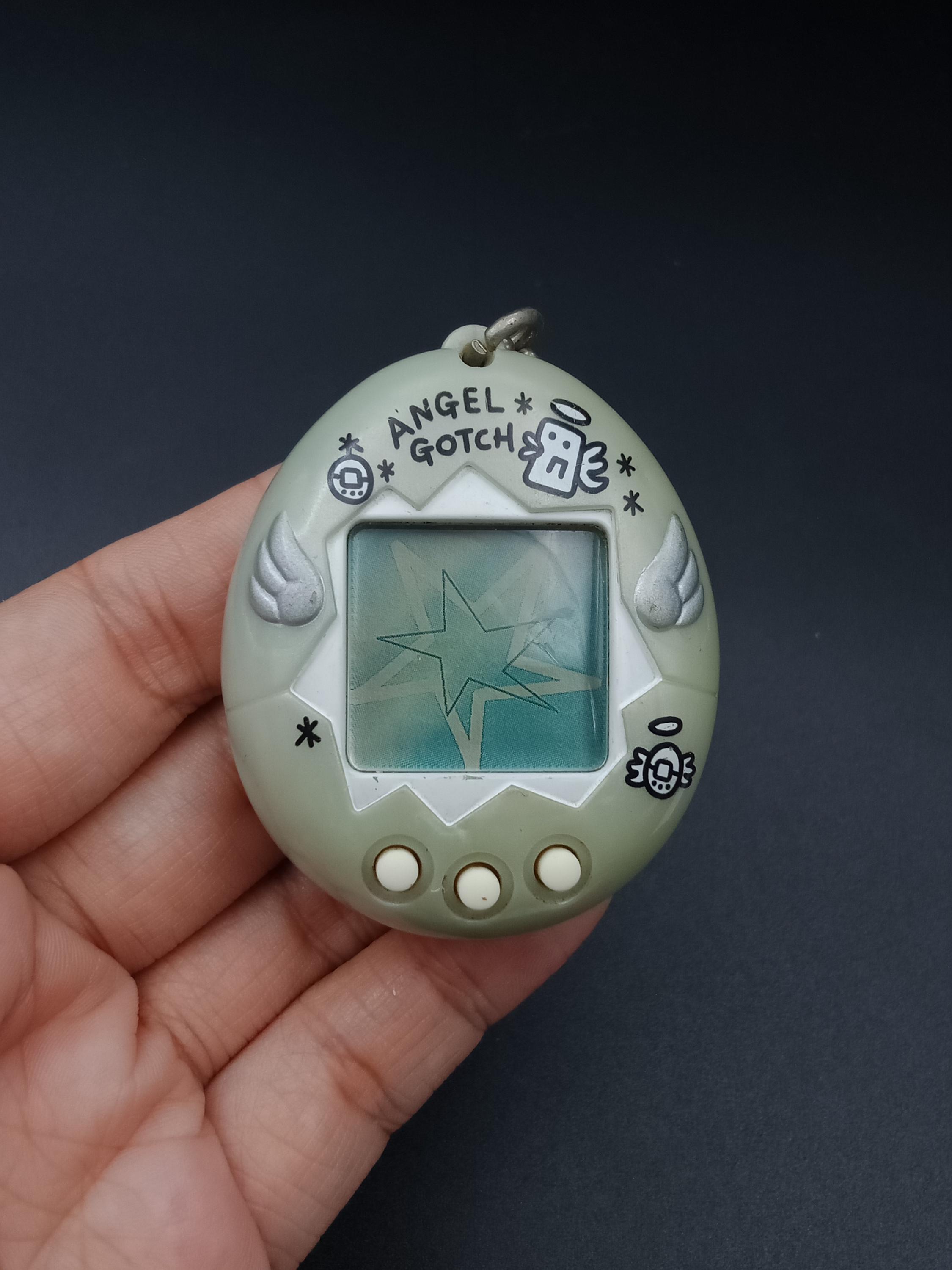 SKU YU147 | Bandai Japanese Tamagotchi Angel Gotch Silver Toy - Etsy