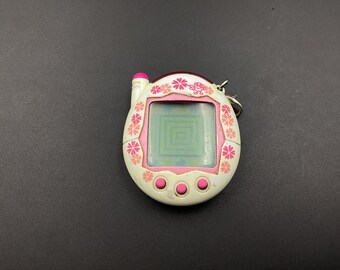 Original Tamagotchi (Gen. 1) Pink and Yellow Virtual Pet