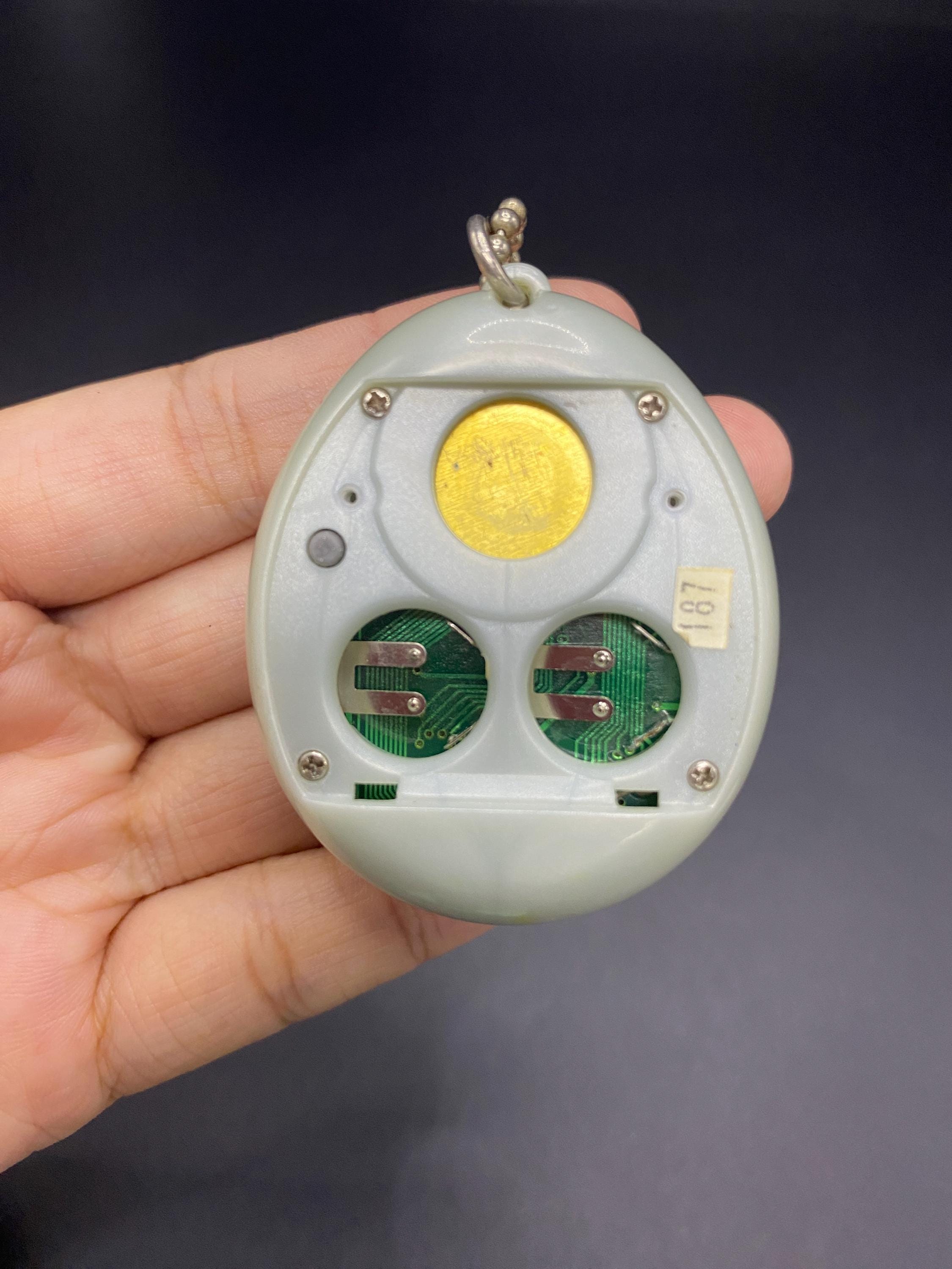 SKU B45P412 TA8 | BANDAI Tamagotchi Angel 1997 Blue Japanese