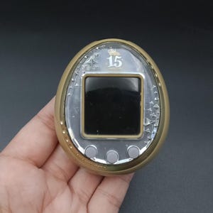 たまごっち Tamagotchi iD L 15th NEW] Tamagotchi iD L 15th Anniversary ver. - Royal Pink Bandai