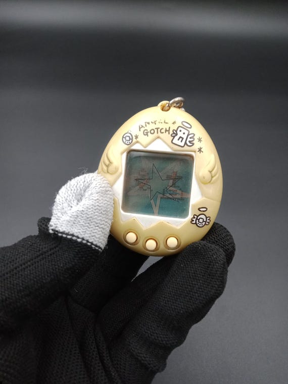 SKU YU 340 | Bandai Tamagotchi Angel Gotch Gold - Etsy