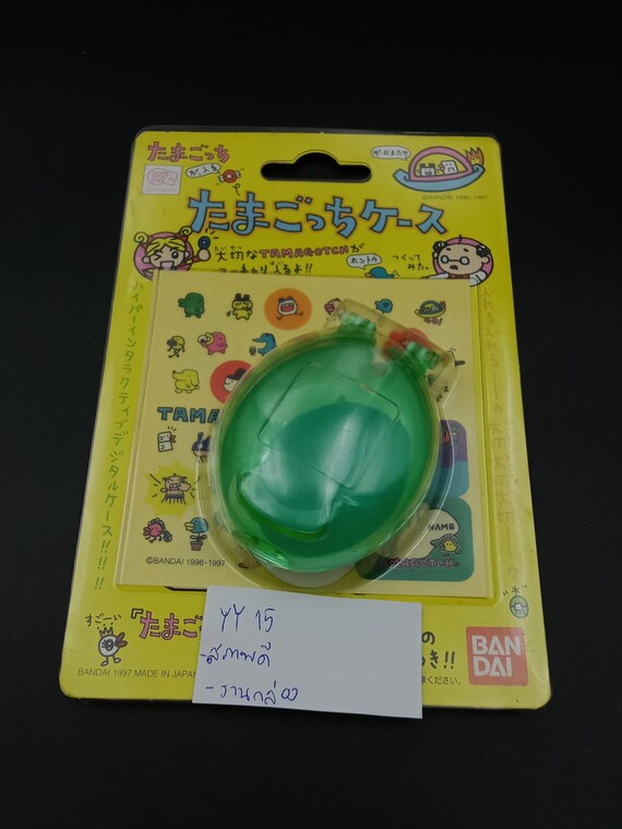 SKU YY15 | Bandai Tamagotchi Green Clear Egg Case With Stickers