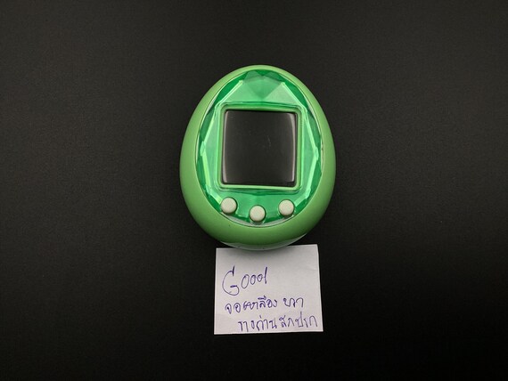 Tamagotchi ID Green Japan Version | Bandai | Used , Sunburned