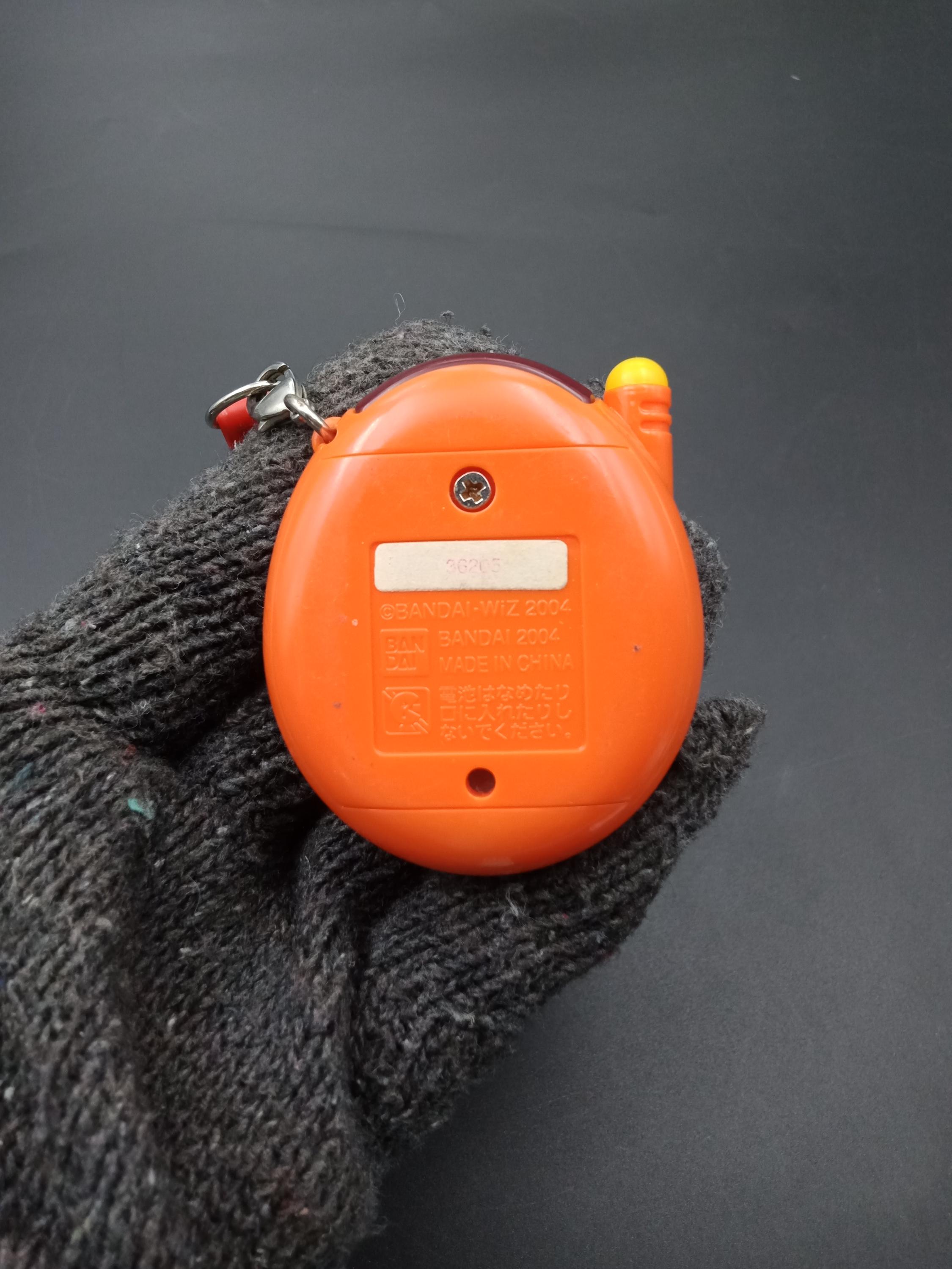 SKU B788P8898 | Tamagotchi Plus Orange Bandai - Etsy Canada