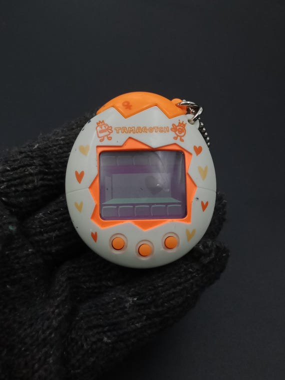 SKU B780P8768 | Bandai Tamagotchi Osutchi and Mesutchi Digital Pet