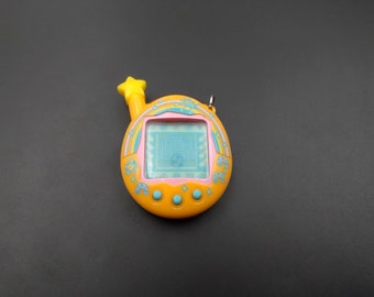 SKU TB F56 | Tamagotchi Connection V4.5 Orange Yellow Good