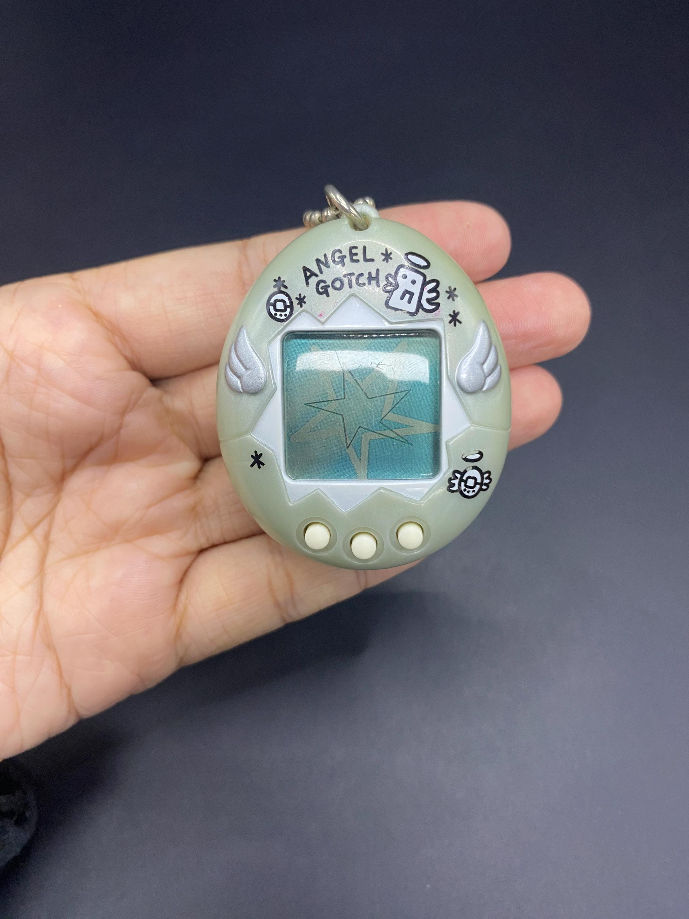 SKU B45P412 TA8 | BANDAI Tamagotchi Angel 1997 Blue Japanese