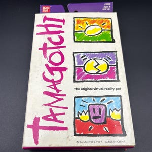 May include: A set of three ceramic nesting bowls in graduating sizes. The bowls feature a speckled, cream-colored exterior and a smooth, light blue interior. The largest bowl is approximately 8 inches in diameter.