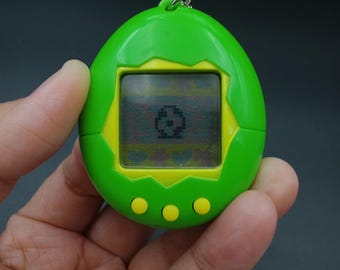 SKU YU343 | Tamagotchi P1/P2 Green Bandai Japanese version