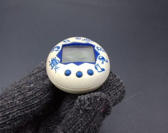 SKU B788P8906 | Bandai Tamagotchi White New Species Discovered - Etsy