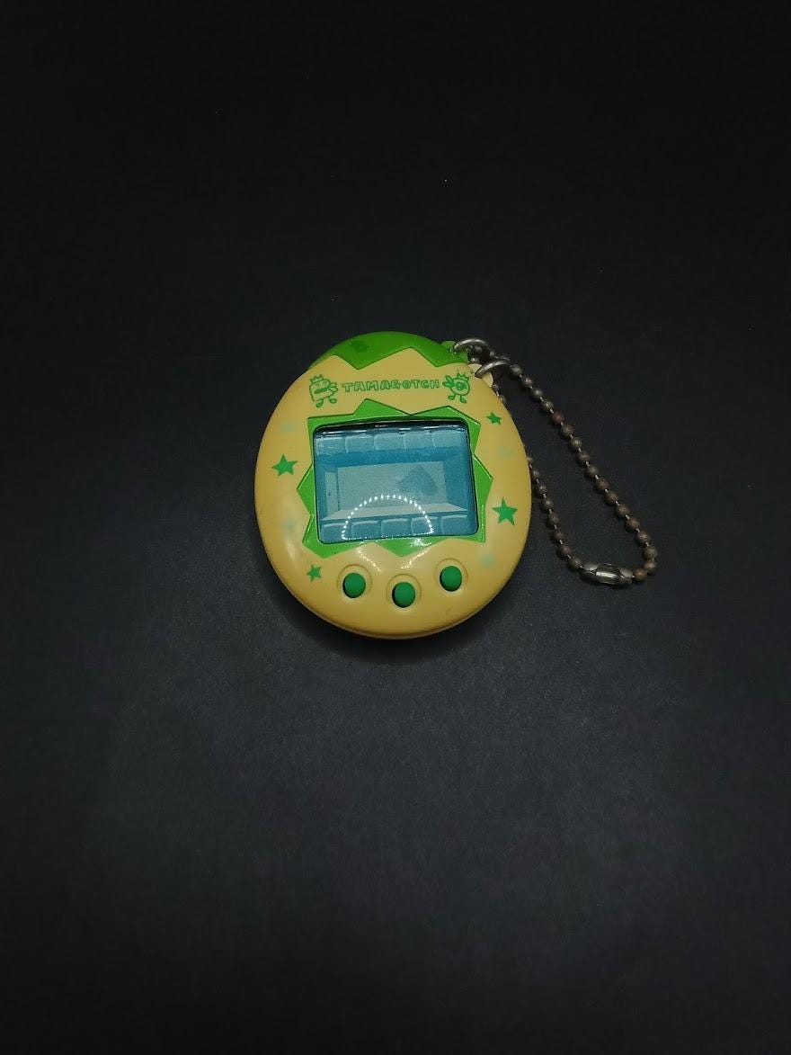 SKU | Bandai Tamagotchi Osutchi Green Virtual Pet - Etsy