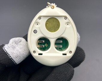 SKU 171260056 | Tamagotchi P1/P2 White First Generation V-pet