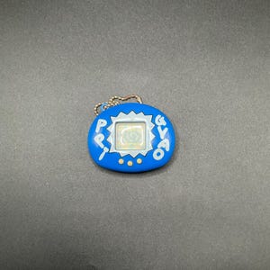 SKU | GYAOPPI Virtual Pet Dinosaur game