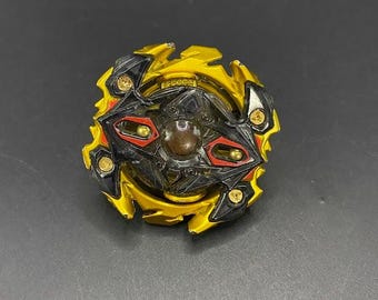 SKU B631P6641BE4 | Beyblade Burst Gold God Bey Zillion Zeus MV