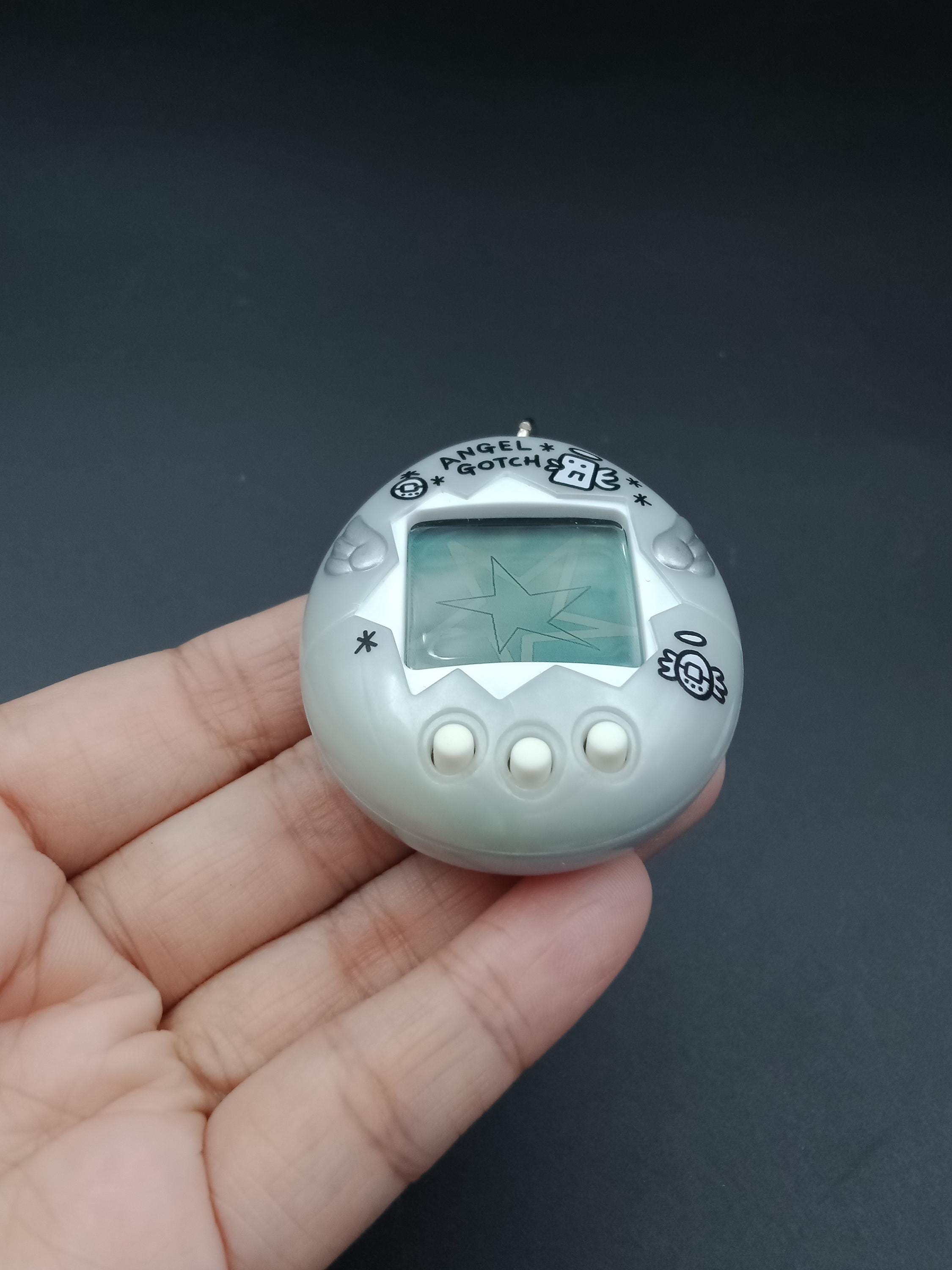 SKU B924P11740 | Bandai Japanese Tamagotchi Angel Gotch Silver - Etsy