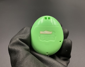 Tamagotchi ID Green Japan Version | Bandai | Used , Sunburned