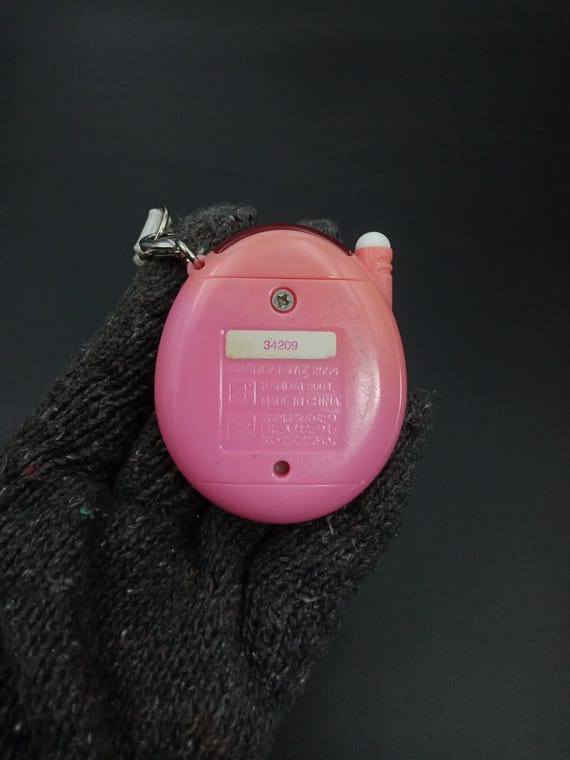 SKU B777P8712 | Tamagotchi Plus Red Series Pink Fruit Color