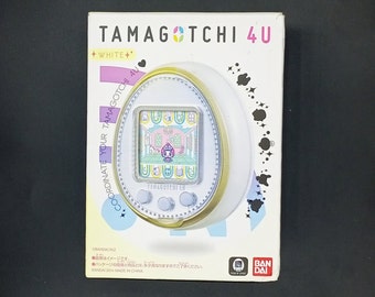 Tamagotchi 4U with box and manual japanese (0101345)