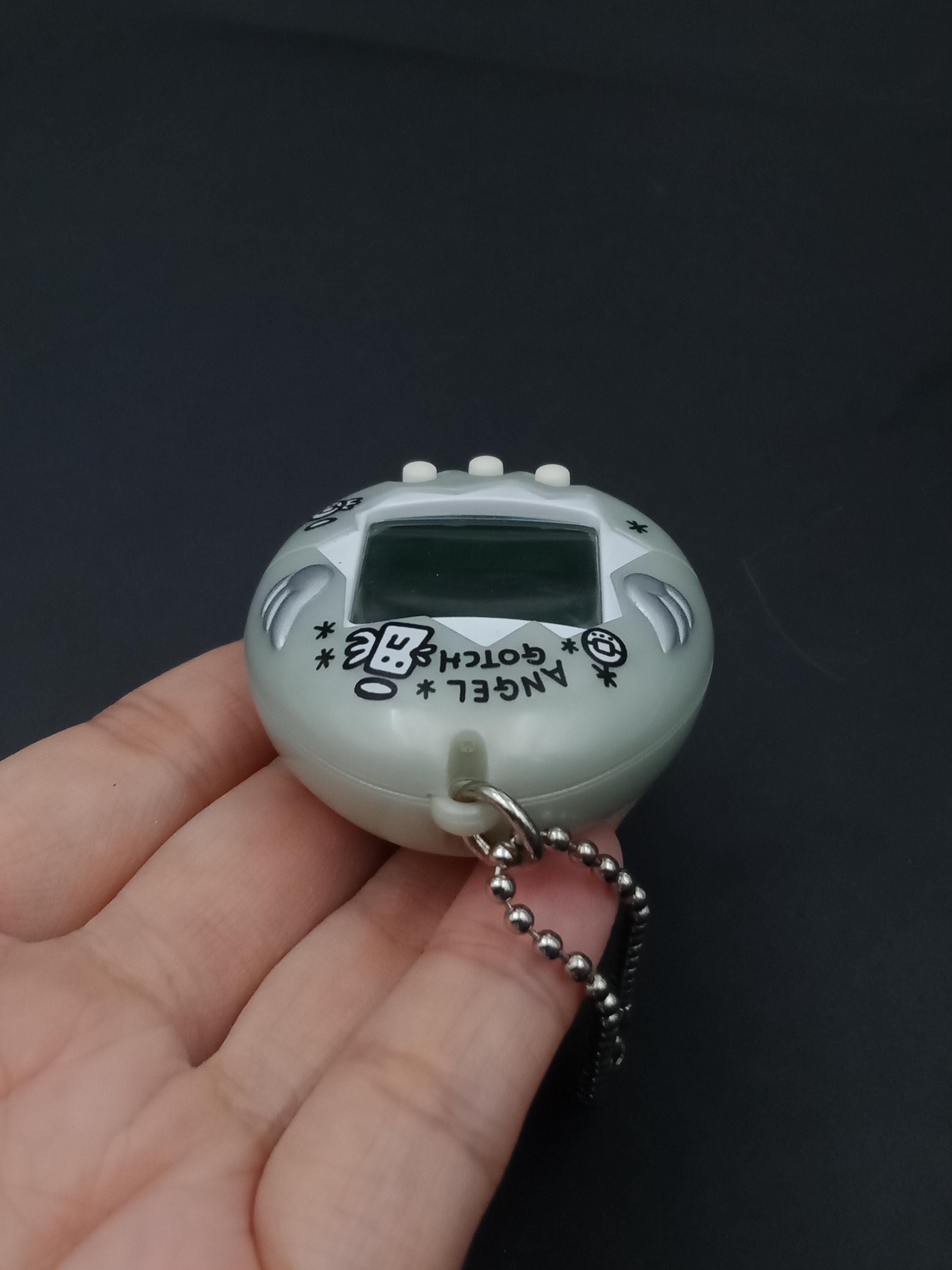 ＡＮＧＥＬ ＧＯＴＣＨ SKU B913P11653TA8 | Bandai Tamagotchi Angel Gotch Silver - Etsy Canada