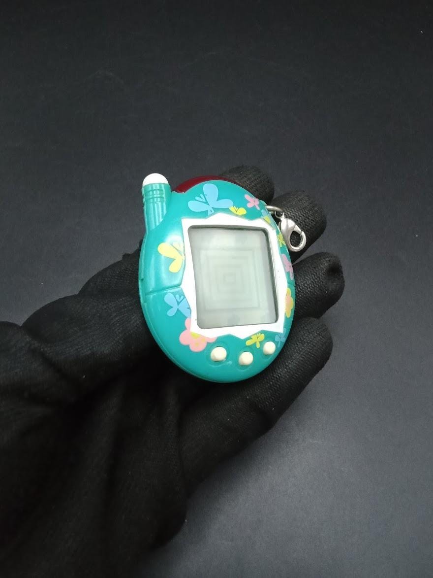 たまごっちプラス Amazon.co.jp: 超じんせーエンジョイ!たまごっちプラス フリルぴんく