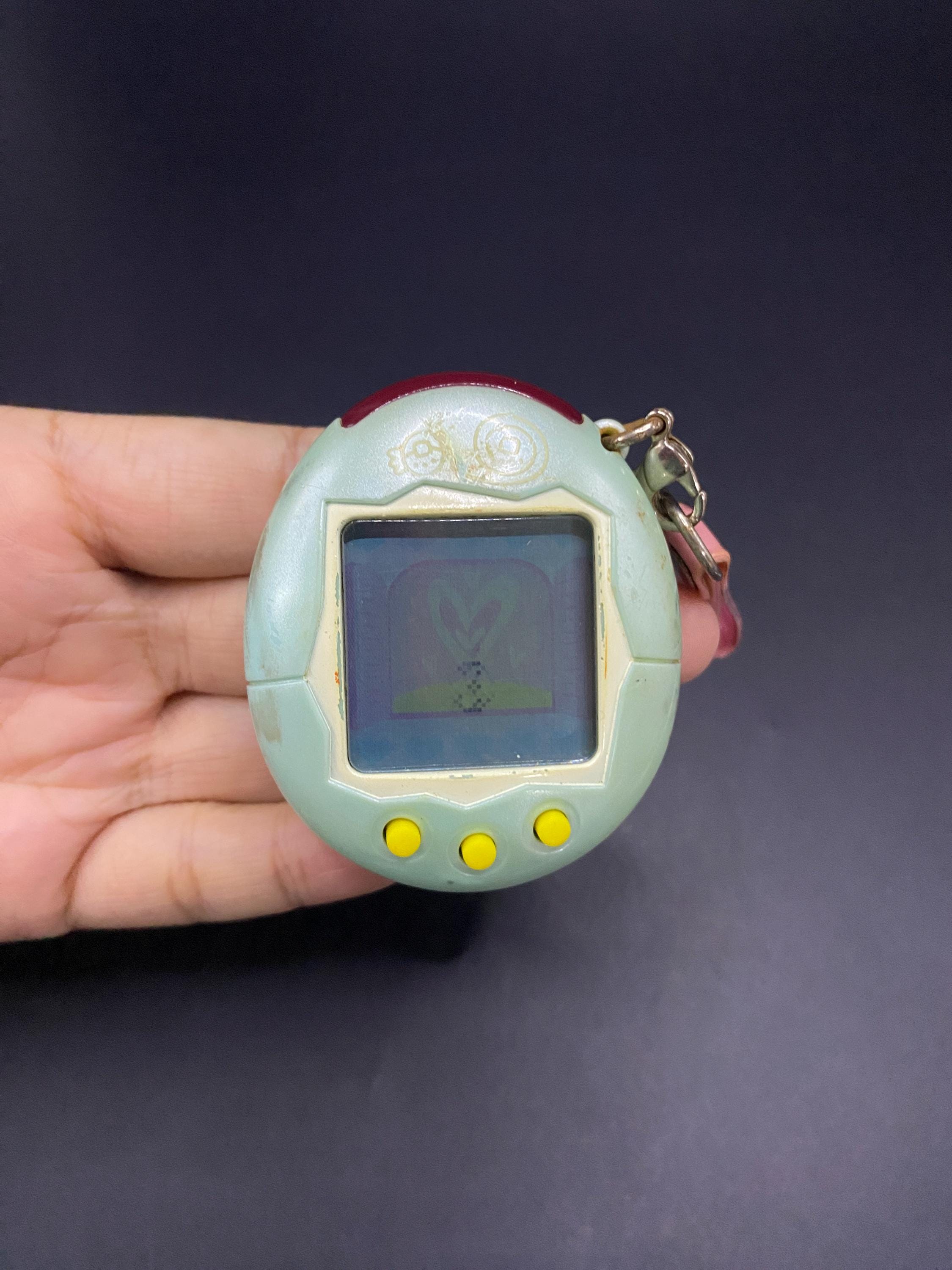 たまたま SKU B639P6705TA5 | Tamagotchi Plus Connection Version 1 Light Blue
