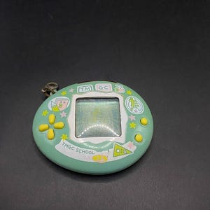 SKU B650P7008 | Tamagotchi school blue , Japan version